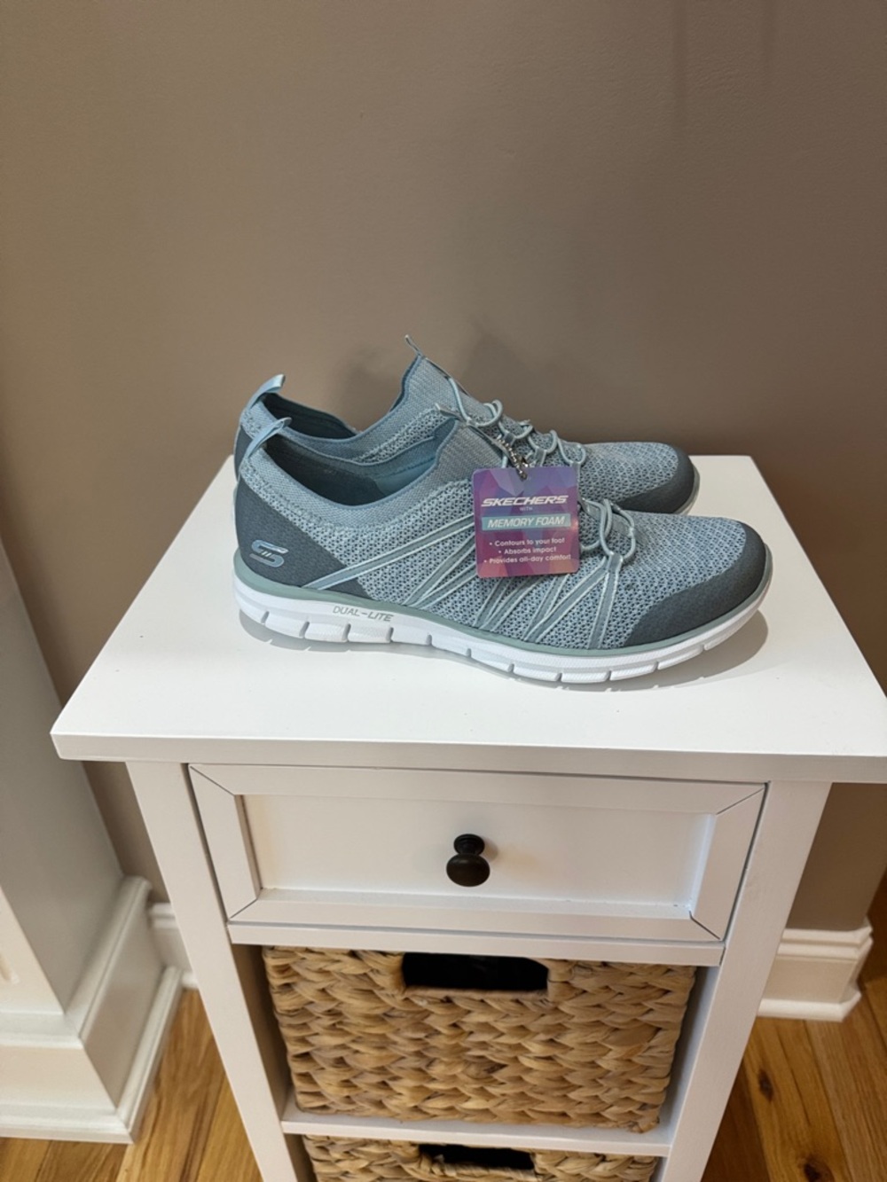 Skecherse women’s   Light aqua Knit Slip-On Sneakers never worn!